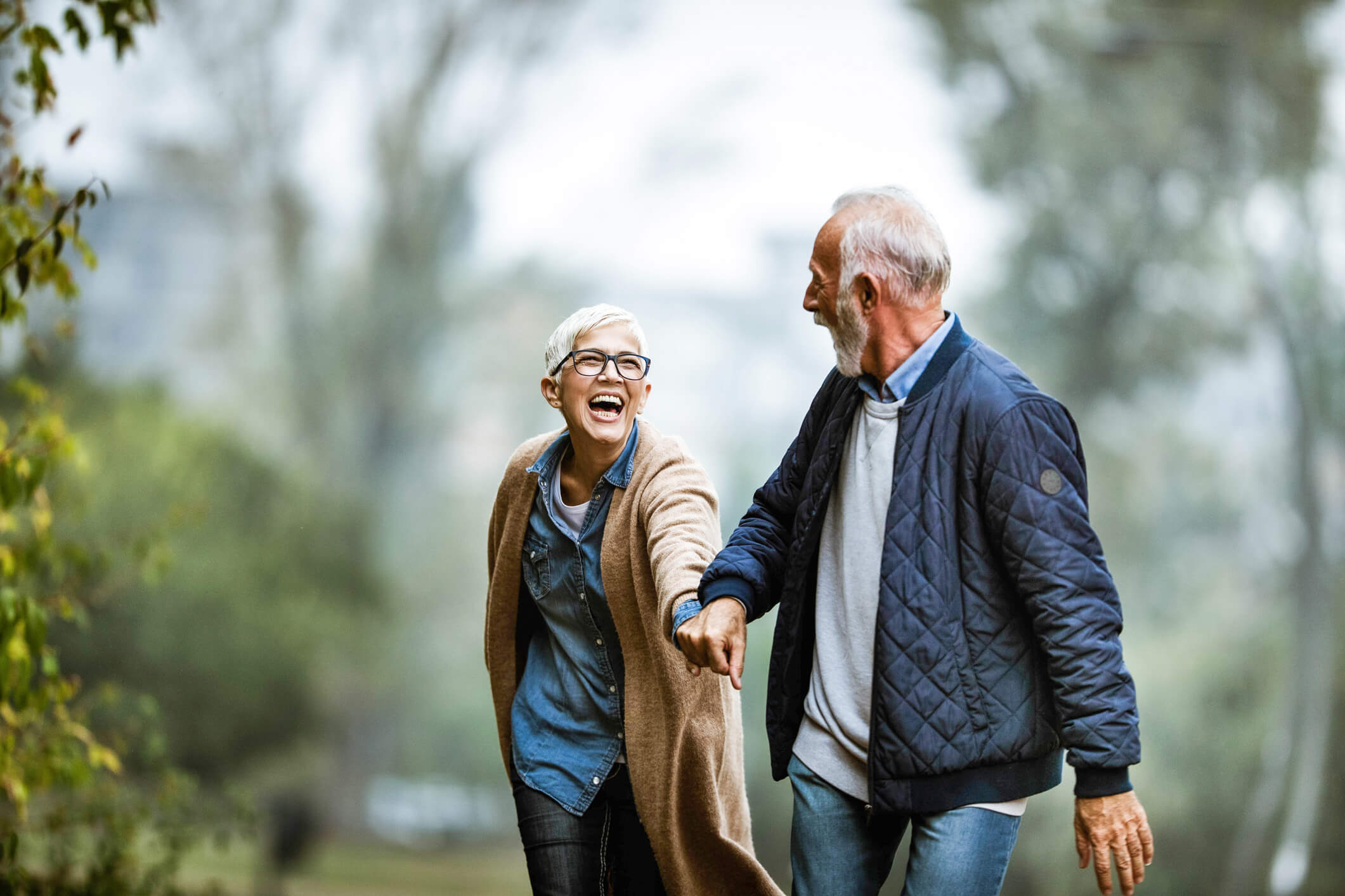 Happy couple going on a walk together