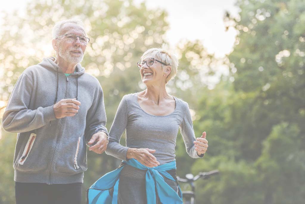 Mature couple going for a jog.