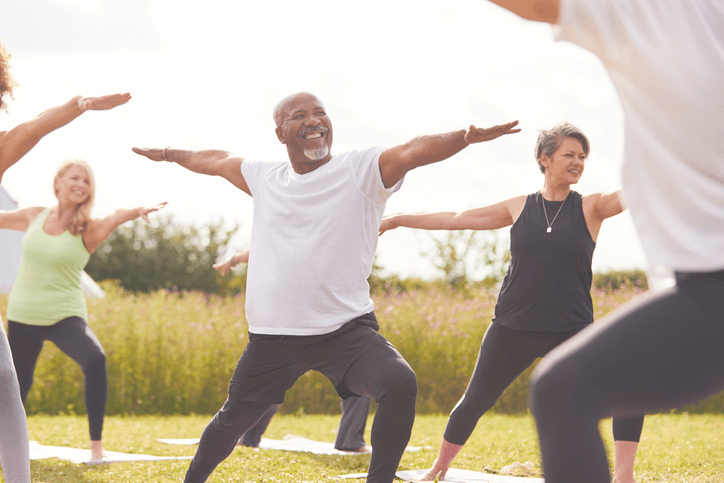 Diverse group doing yoga